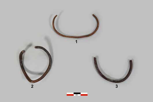 Three corroded copper bangles excavated from the Late Harappan layer at Hulas